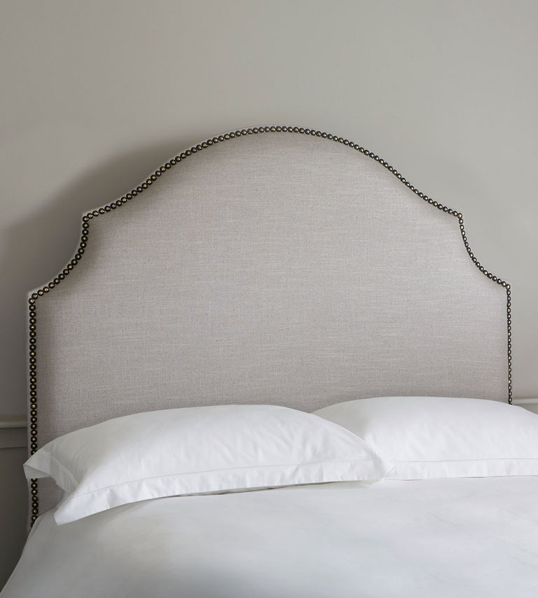 Headboard with brass studs The Dormy House