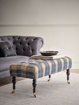 Portland deep buttoned footstool with castors