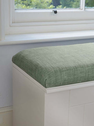 Upholstered seat pad